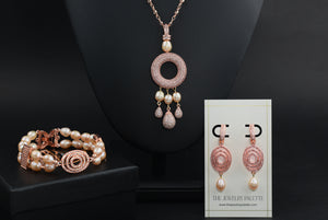 Juliette shimmering rose gold earrings with pink pearl drops