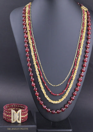 Irene luxurious maroon and gold four tier necklace