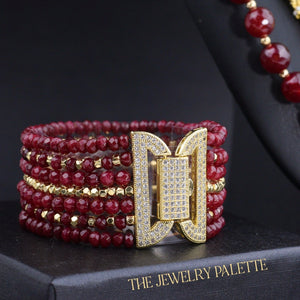 Irene luxurious maroon and gold four tier necklace