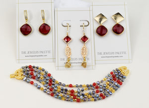 Penelope red gemstone earrings and necklace