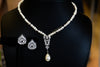 Safa white freshwater pearl earrings and necklace