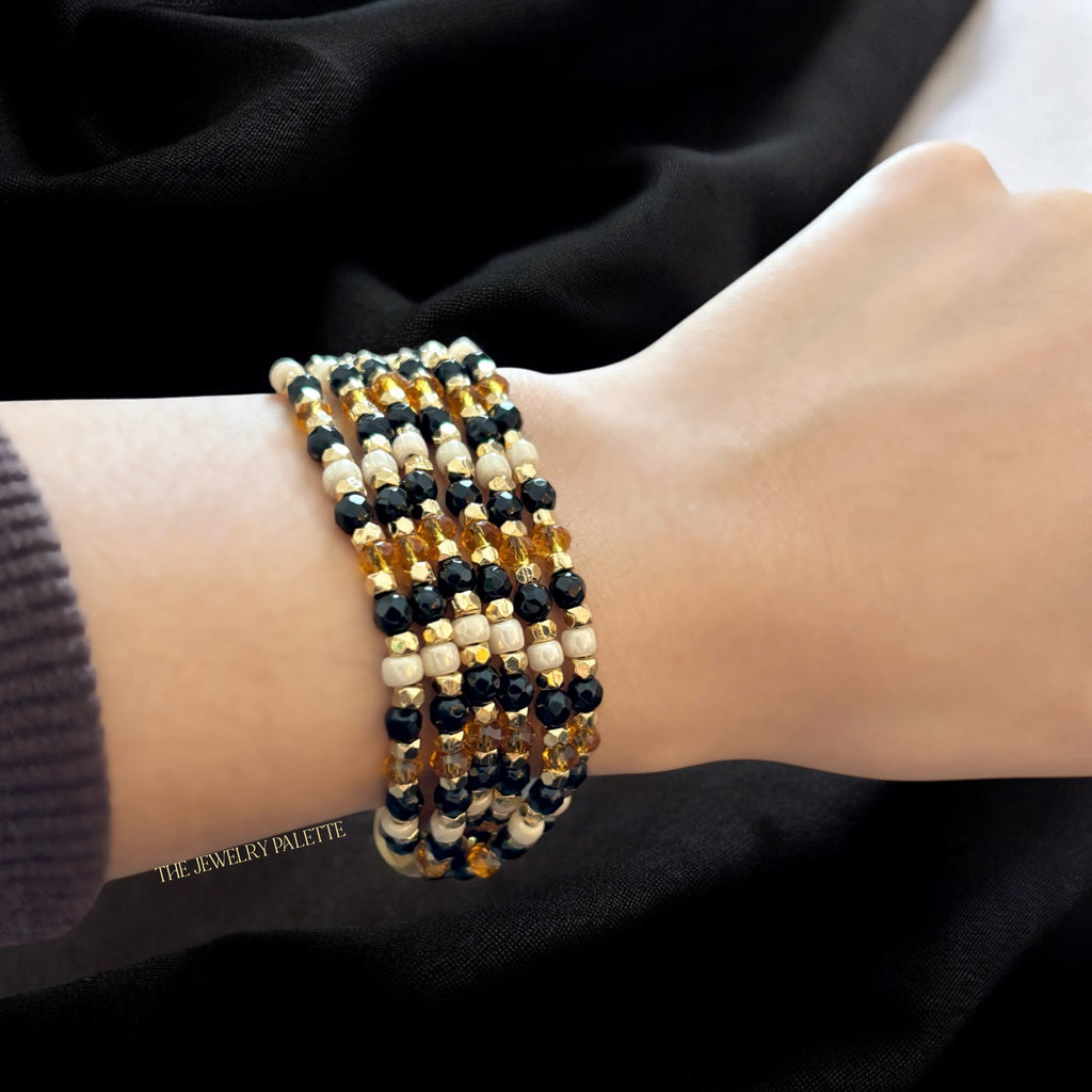 Hajr multitier black and gold bracelet