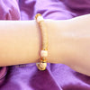 Marjaan white freshwater pearl bracelet with gold centerpiece