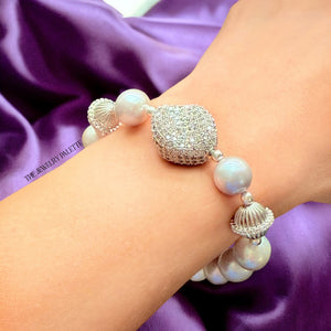 Celine grey freshwater pearl bracelet with silver centerpiece