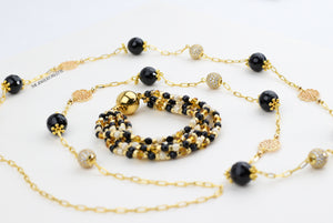 Hajr multitier black and gold bracelet