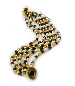 Hajr multitier black and gold bracelet