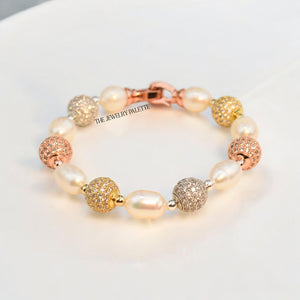 Fleur white freshwater pearl bracelet with gold, silver and rose gold accents