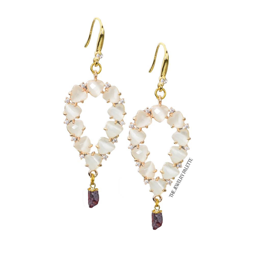 Yara white stones with gold edged garnet drop earrings