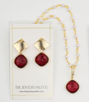 Penelope red gemstone earrings and necklace