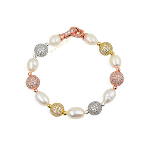 Fleur white freshwater pearl bracelet with gold, silver and rose gold accents