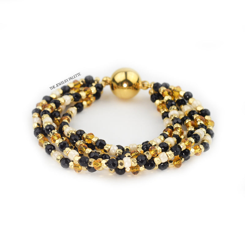 Hajr multitier black and gold bracelet