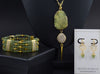 Dania gold leaf with gold edged peridot drop earrings