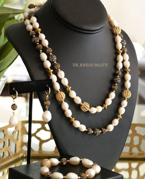 Lunara white freshwater pearl and glittering black stone earrings - The Jewelry Palette